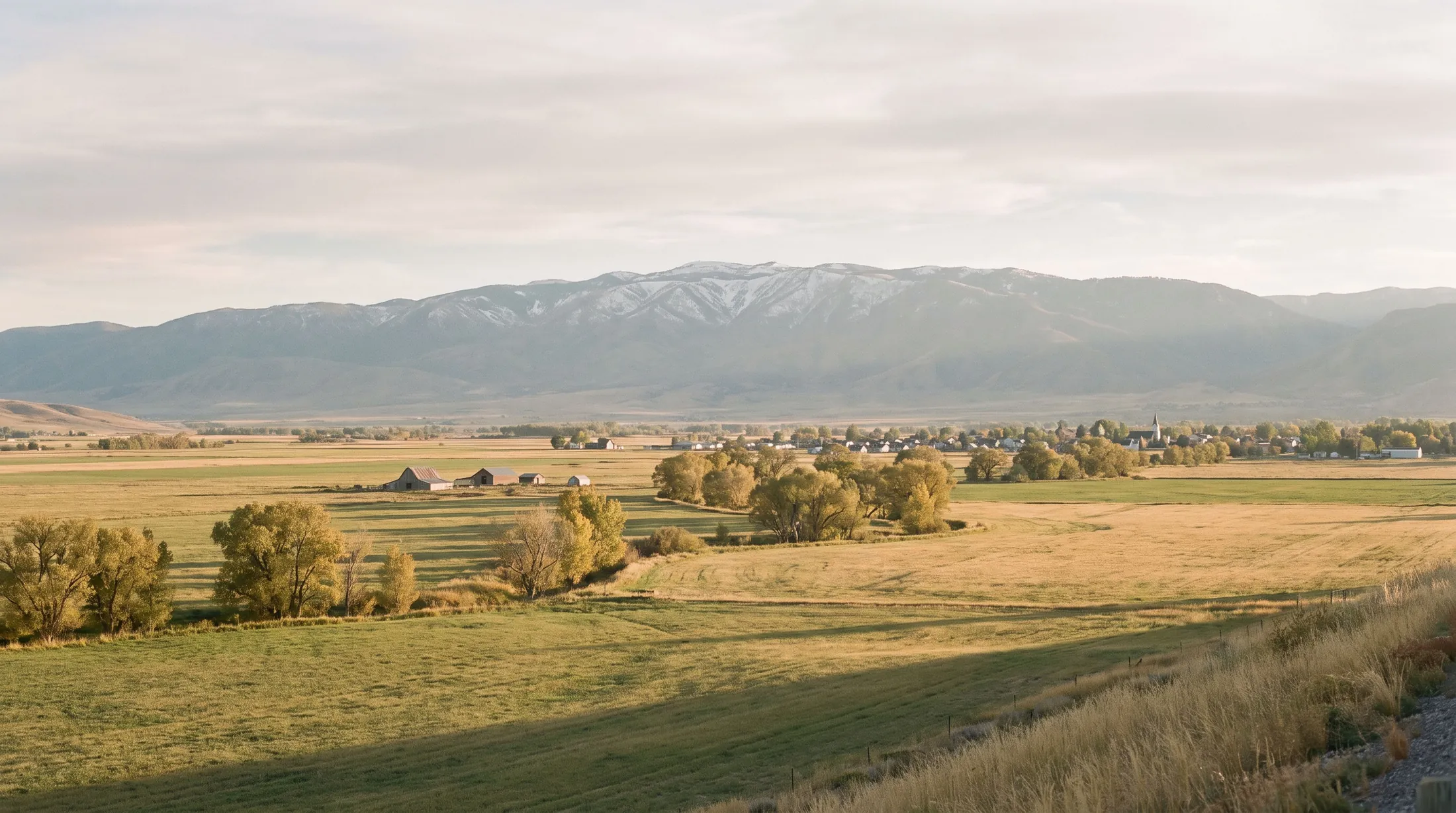 Hay fields and the Wasatch Plateau in Central Utah's Sanpete Valley at late afternoon.